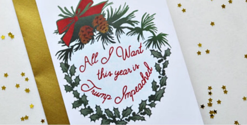 Image of a card that reads all I want for the year is trump impeached
